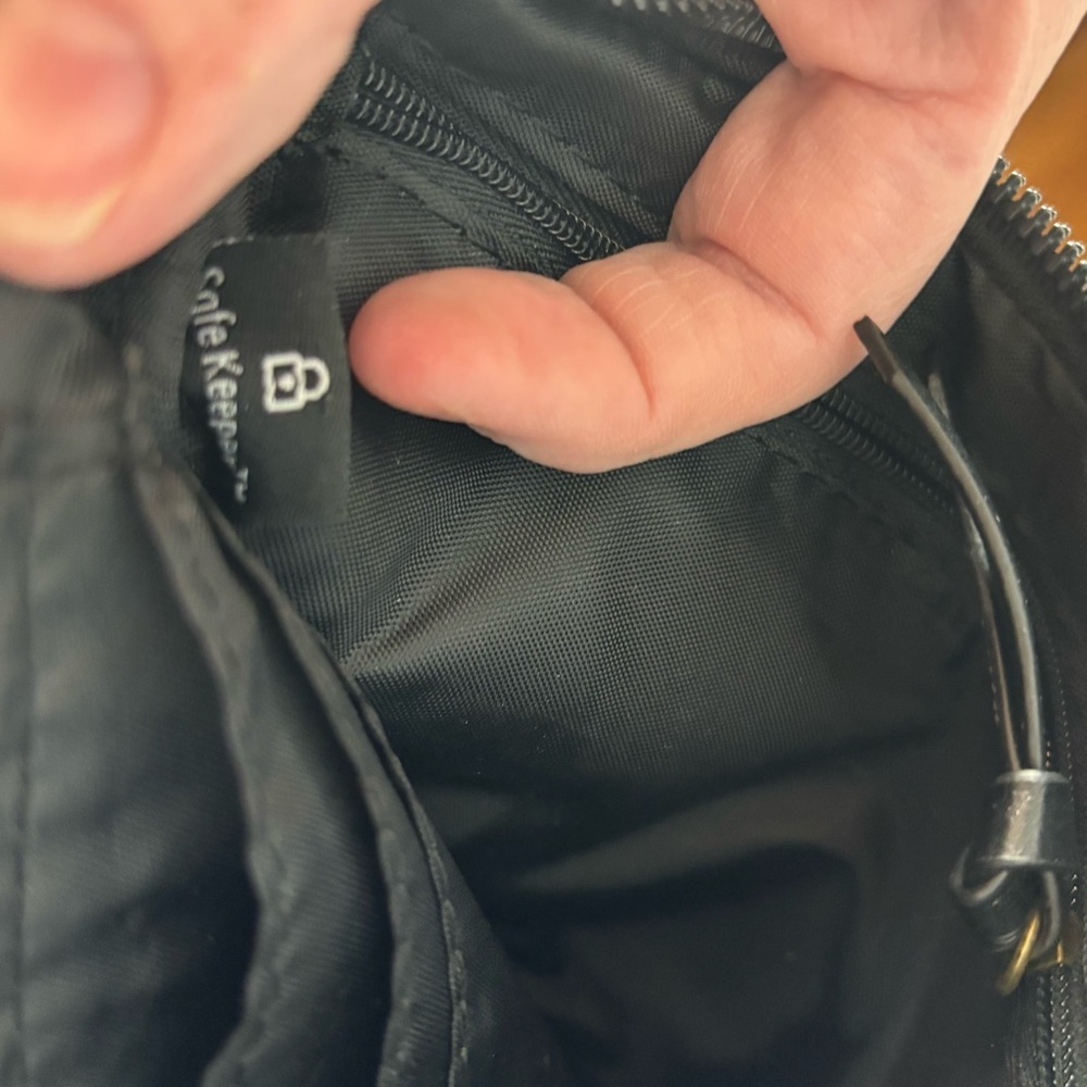 Safe keeper Sleek Black Mini Bag with Modern Design perfect for travel! - Picture 11 of 13